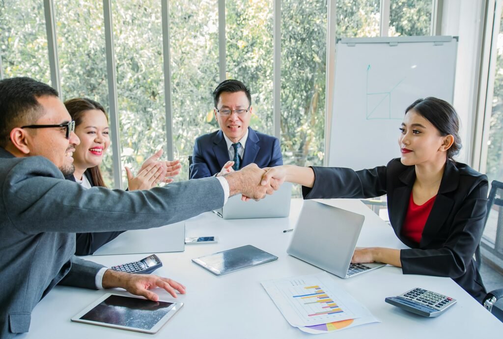 Business man shake hands with partnerships or introducing themselves for first time meet